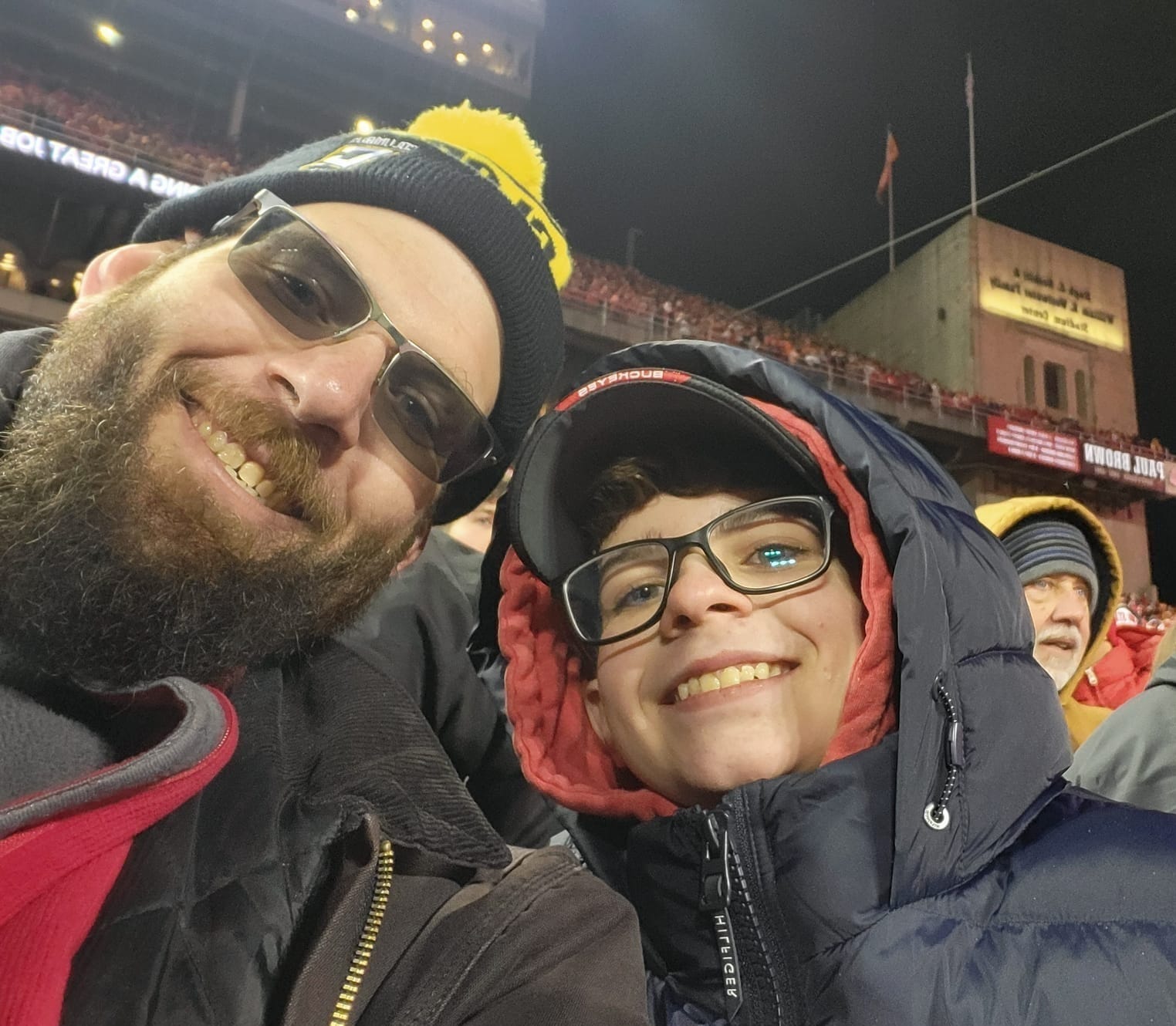 Leo Guinan and his son at an Ohio State football game